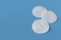 Cotton pads for skin care, for cleansing the face of cosmetics with tonic or micellar cleansing water. Cosmetic products. Royalty Free Stock Photo