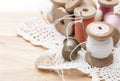 Cotton thread for sewing, wound on a wooden spool Royalty Free Stock Photo