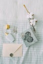 Cotton white envelope bottle earrings ring seal