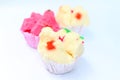 Cotton wool cakes on white background