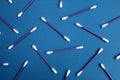 White cotton paper sticks on a blue background