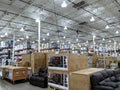 Couch, Food, and other supplies on Display inside Costco