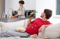 Couch potato doesn't help wife