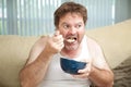 Couch Potato Eating Cereal Royalty Free Stock Photo