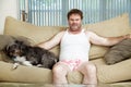 Couch Potato With His Dog Royalty Free Stock Photo
