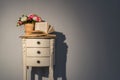 Couch table with flowers and book