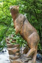 Cougar statue in the woods