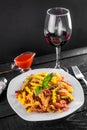 Coulourful pasta with wine