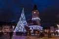 Council Square and Christmas Tree in the old city center of Brasov on a winter night. Royalty Free Stock Photo