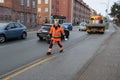 COUNCIL WORKER SPREADING DUE TO SLIPPER ROAD