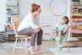 Counselor talking with worried boy Royalty Free Stock Photo