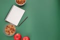 Count calories of healthy food snecks: oatmeal, almonds, apple. Royalty Free Stock Photo