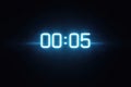 Countdown Timer Showing Five Seconds Remaining Before an Event or Activity Begins in a Dark Background Royalty Free Stock Photo
