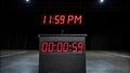 Countdown to midnight on digital clock display Royalty Free Stock Photo