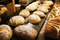 Counter with fresh soft baked bread on blurry background