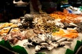 The counter on the market, seafood on ice, mussels,salmon, snapper. The Boqueria Market in Barcelona, Spain. Royalty Free Stock Photo