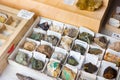 Counter with various semi-precious and ornamental stones. Names of stones in Spanish. Spain