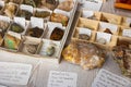 Counter with various semi-precious and ornamental stones. Names of stones in Spanish. Spain