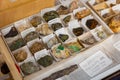 Counter with various semi-precious and ornamental stones. Names of stones in Spanish. Spain