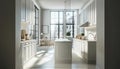 counter with white cabinets in a light, spacious kitchen with a window, located in a modern, empty open-plan stylish Royalty Free Stock Photo