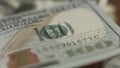 Counterfeit money detection, one hundred dollar bill closeup, banking concept