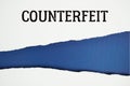 Counterfeit text on blue with white paper torn ripped of horizontal Royalty Free Stock Photo