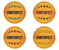 COUNTERFEIT text, on round wavy border vintage, stamp badge. Royalty Free Stock Photo