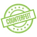 COUNTERFEIT text written on green vintage stamp Royalty Free Stock Photo
