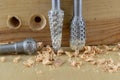 Countersink used in joinery for reaming holes. Joinery accessories on a workshop table