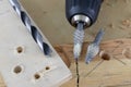 Countersink used in joinery for reaming holes. Joinery accessories on a workshop table