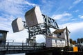 Counterweights of the Mystic River Bascule Bridge while it is closed so traffic can pass as seen from the side Mystic Conneticut U