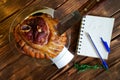 Counting calories, proteins, fats and carbohydrates in food. Fried pork knuckle in a transparent plate on the kitchen scale. Diet Royalty Free Stock Photo