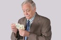 Counting Out His Money Royalty Free Stock Photo