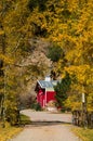 Country Barn and Rural Road in Autumn Royalty Free Stock Photo