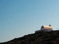Country chapel on hilltop at dusk  Donoussa  Cyclades islands  Greece Royalty Free Stock Photo