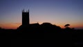 This serene scene of a country church in Cornwall England photographed at Sunset