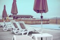 Country club recreation recreation relax pool wooden house forest trees sun lounger umbrella. Royalty Free Stock Photo