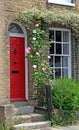 Country cottage door roses Royalty Free Stock Photo