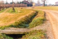 Country dirt road and ditch