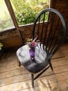 Country Flowers On Wooden Chair In Shabby Chic Shack