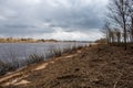 country forest river in early spring with no vegetation on the shores Royalty Free Stock Photo