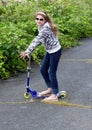 Country Girl on Skate Scooter Royalty Free Stock Photo