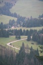 country gravel road leading up to the mountains - vintage retro Royalty Free Stock Photo