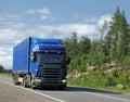 Country highway and blue truck Royalty Free Stock Photo