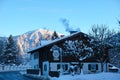 Country hotel in snow-covered alpine landscape
