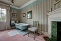 Country House bathroom with cast iron bath tub Royalty Free Stock Photo