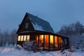 Country house (dacha) in winter dawn. Russia.