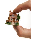 A country house between fingers Royalty Free Stock Photo