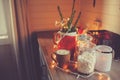 Country house kitchen decorated for Christmas and new year Holidays. Marhmallows, candles, cocoa and nuts in modern jars Royalty Free Stock Photo