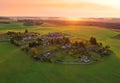 Country houses in the countryside. Aerial view of roofs of green field with rural homes. Village with wooden home. Suburban house Royalty Free Stock Photo